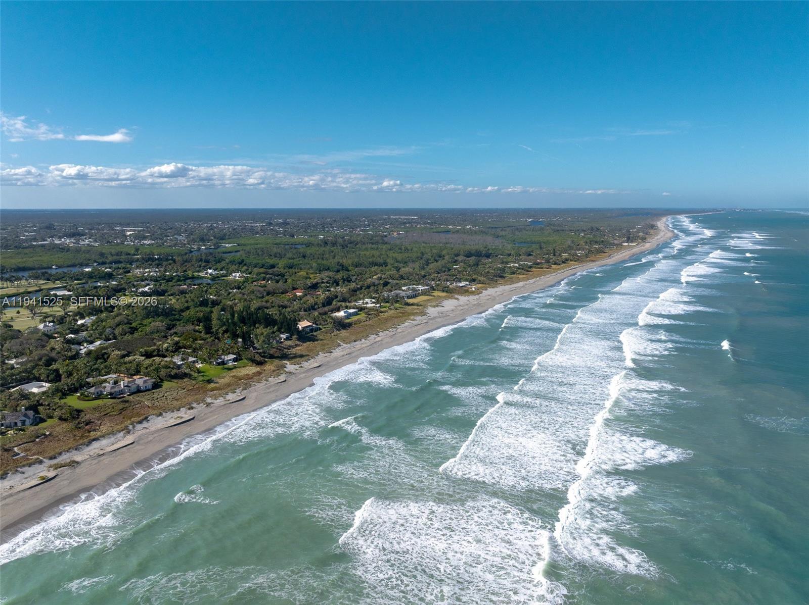 21 South Beach Road Jupiter Island, FL 33455 - Photo 43 of 45 a view of a lake with a mountain