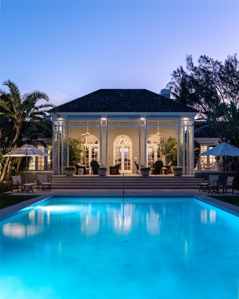 21 South Beach Road Jupiter Island, FL 33455 - Photo 5 of 45 a view of swimming pool with outdoor seating