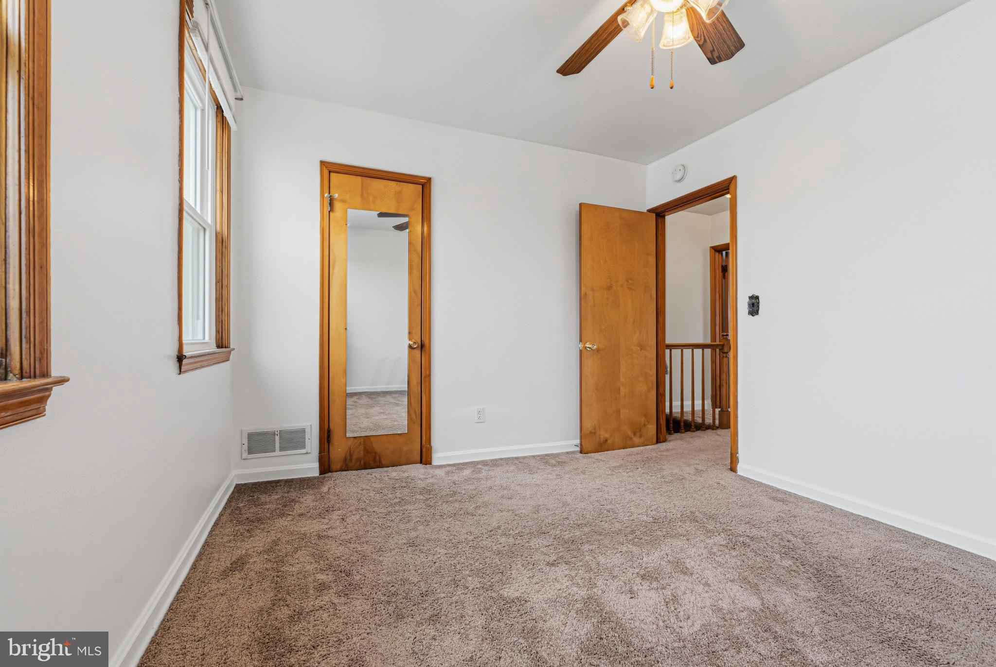 1242 Delbert Avenue Baltimore, MD 21222 - Photo 17 of 34 a view of an empty room with a window