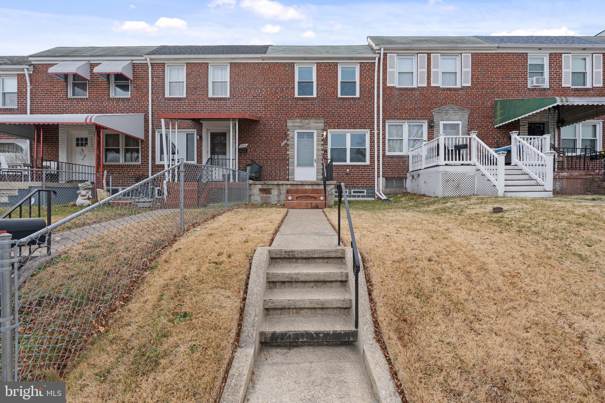 1242 Delbert Avenue Baltimore, MD 21222 - Photo 25 of 34 a view of a brick building with many windows
