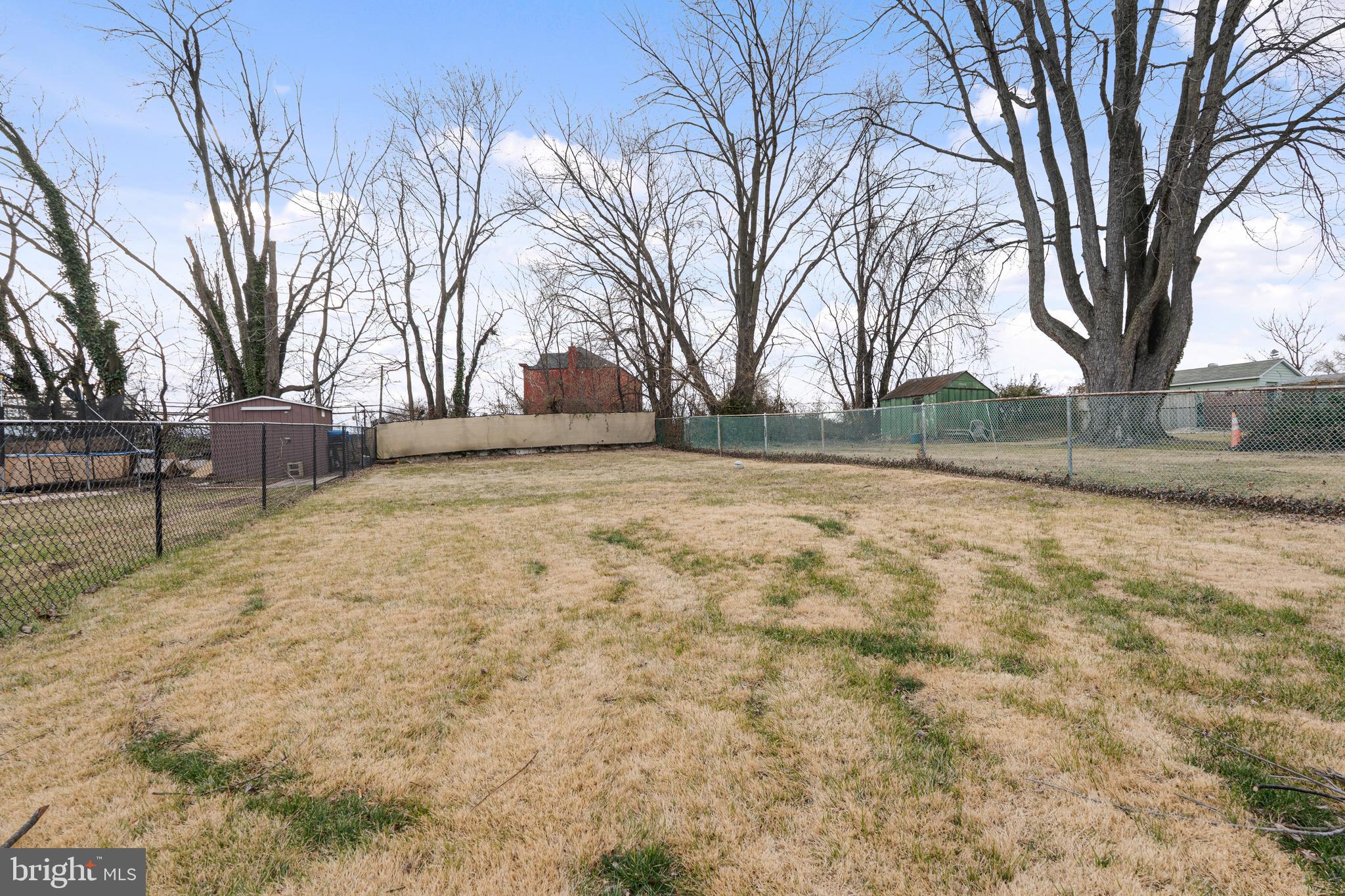 1242 Delbert Avenue Baltimore, MD 21222 - Photo 29 of 34 a view of a yard with a house