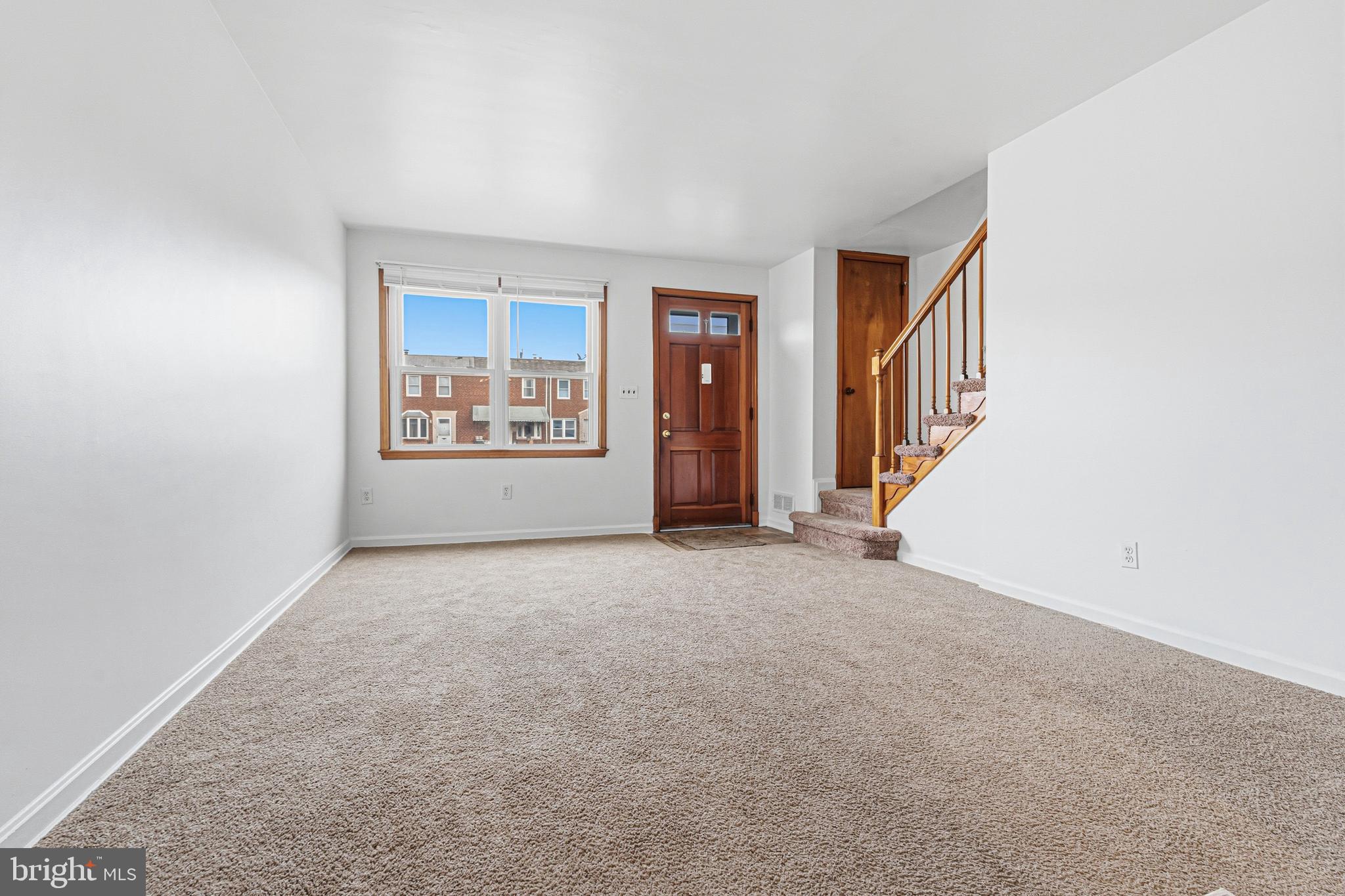 1242 Delbert Avenue Baltimore, MD 21222 - Photo 7 of 34 an empty room with windows