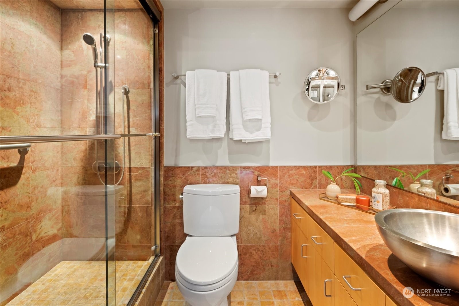 2021 1st Avenue, Unit G2 Seattle, WA 98121 - Photo 13 of 24 a bathroom with a toilet sink and shower