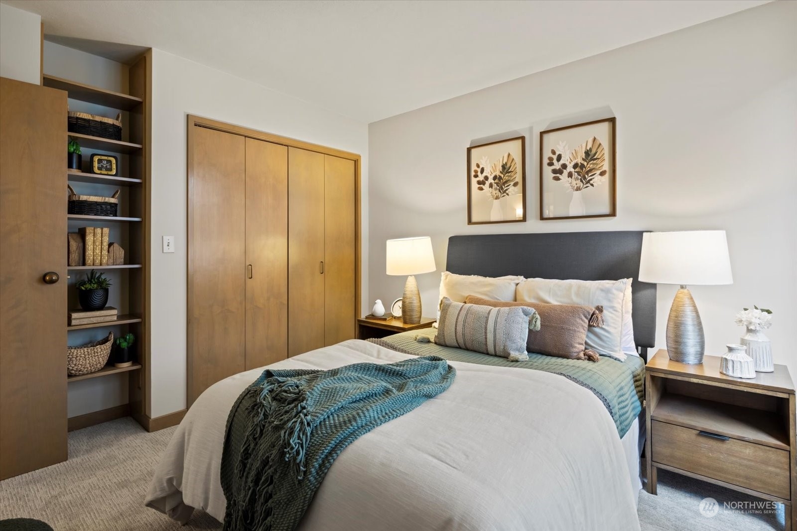 2021 1st Avenue, Unit G2 Seattle, WA 98121 - Photo 18 of 24 a bedroom with a bed and a lamp
