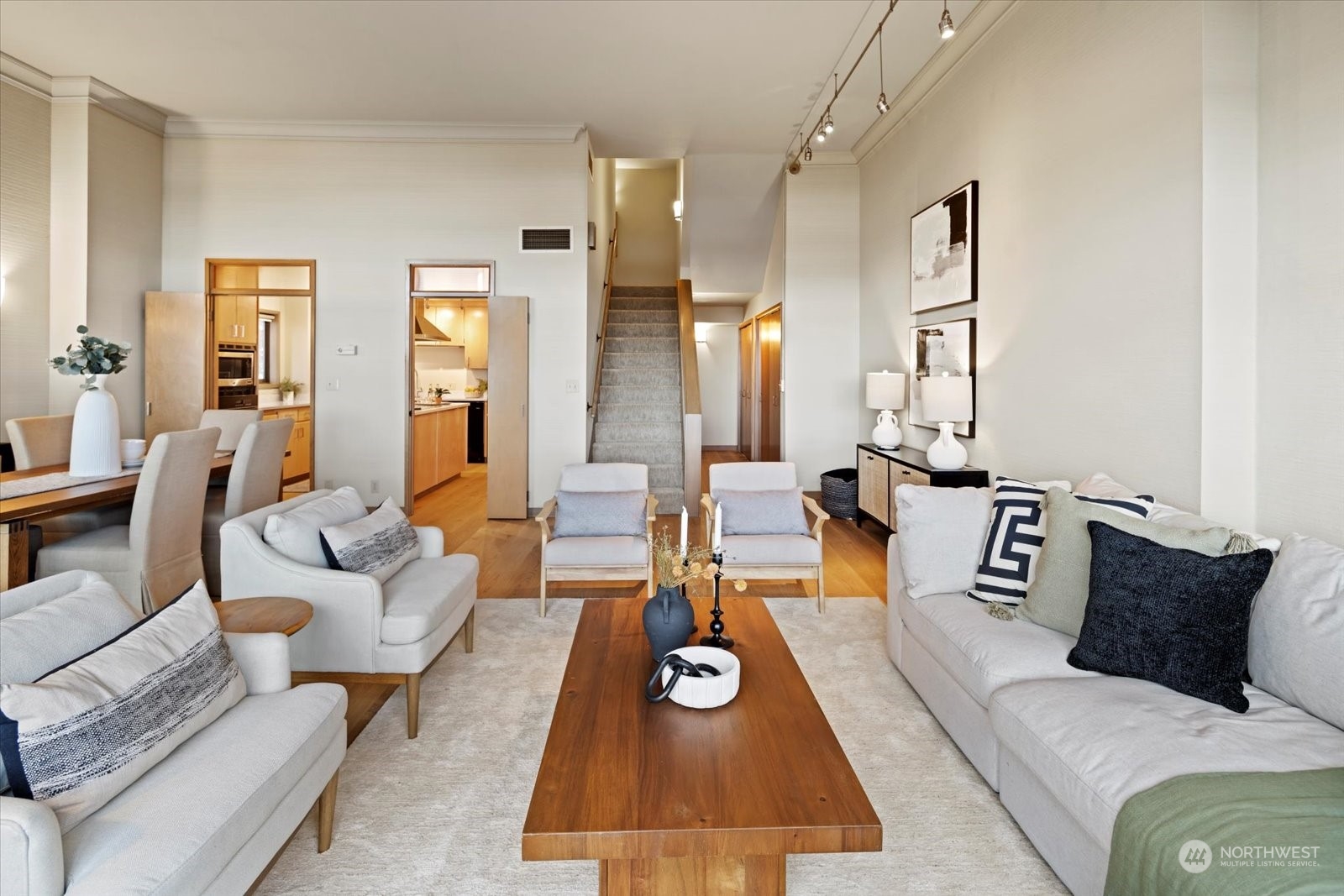 2021 1st Avenue, Unit G2 Seattle, WA 98121 - Photo 4 of 24 a living room with furniture and wooden floor