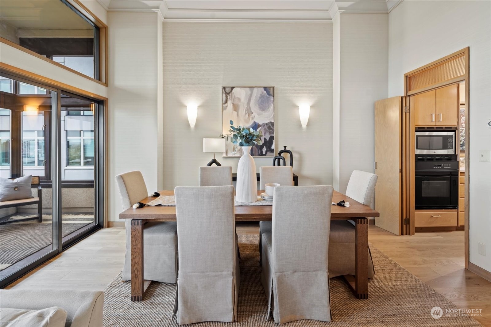 2021 1st Avenue, Unit G2 Seattle, WA 98121 - Photo 5 of 24 a view of a dining room with furniture