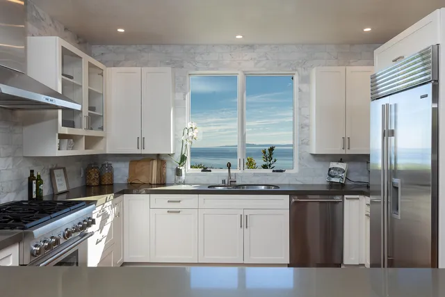 a bedroom with a bed and a television