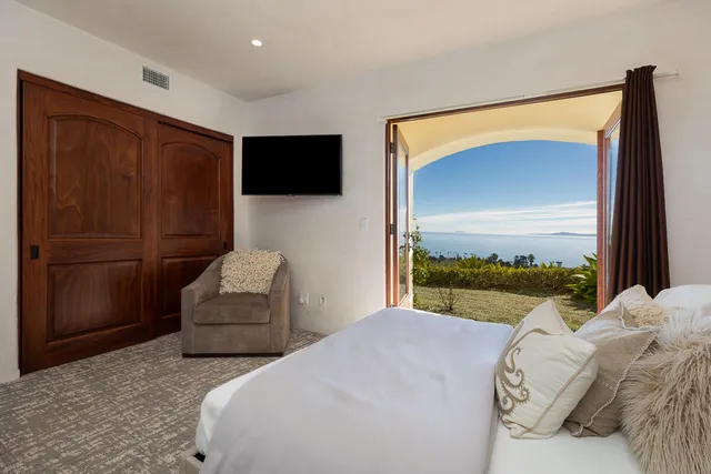 a view of a balcony with an outdoor space