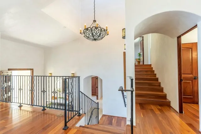 a living room with furniture fireplace and a flat screen tv