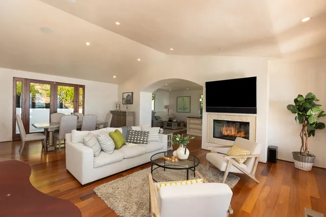 a view of a couches in the balcony