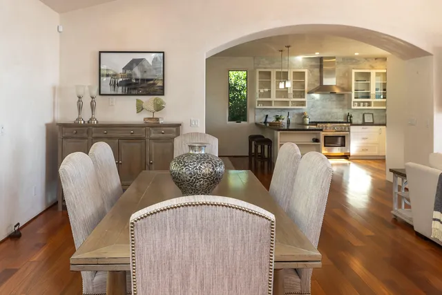 a living room with furniture fireplace and a flat screen tv