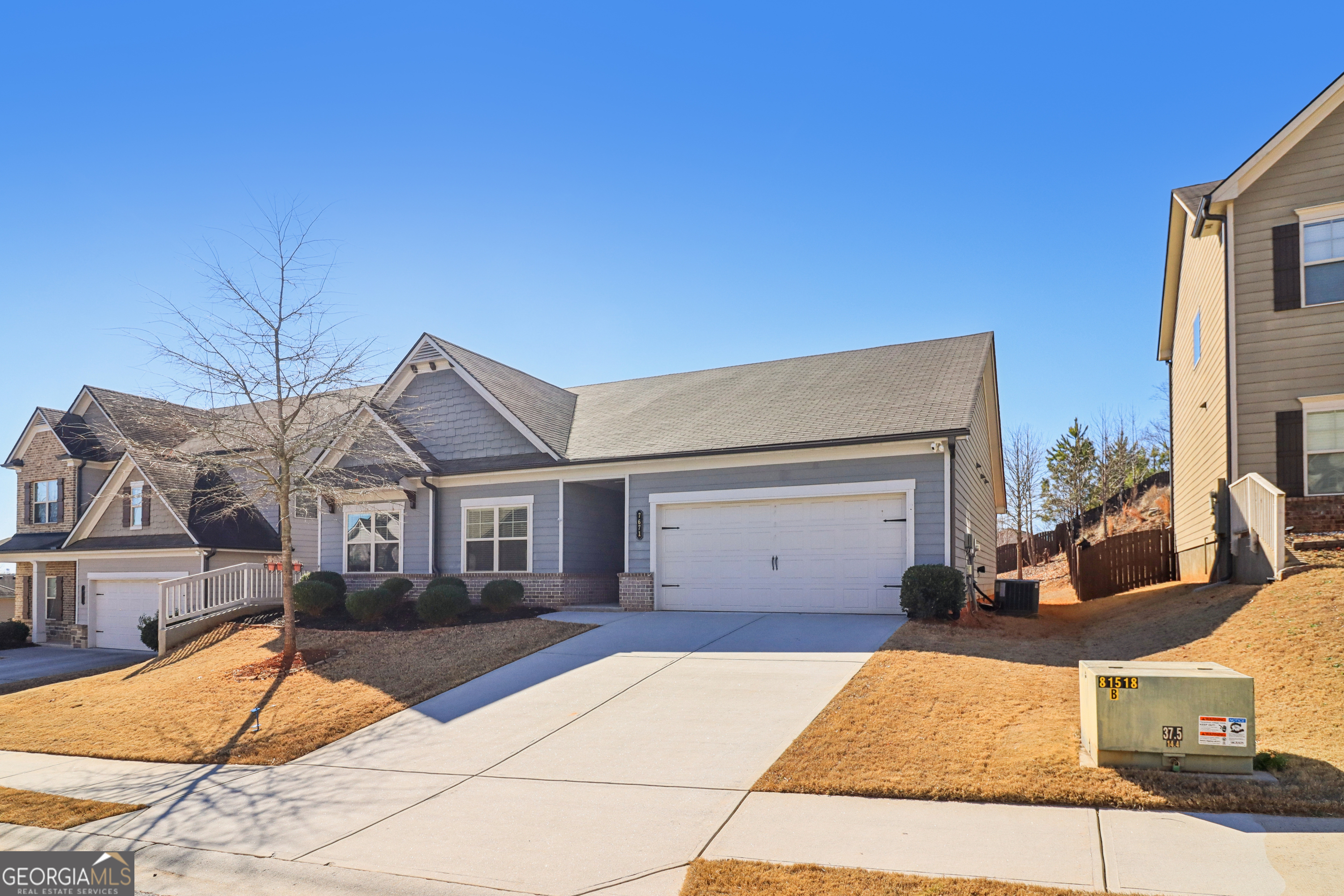 7671 Silk Tree Braselton, GA 30517 - Photo 4 of 92 front view of a house with a patio