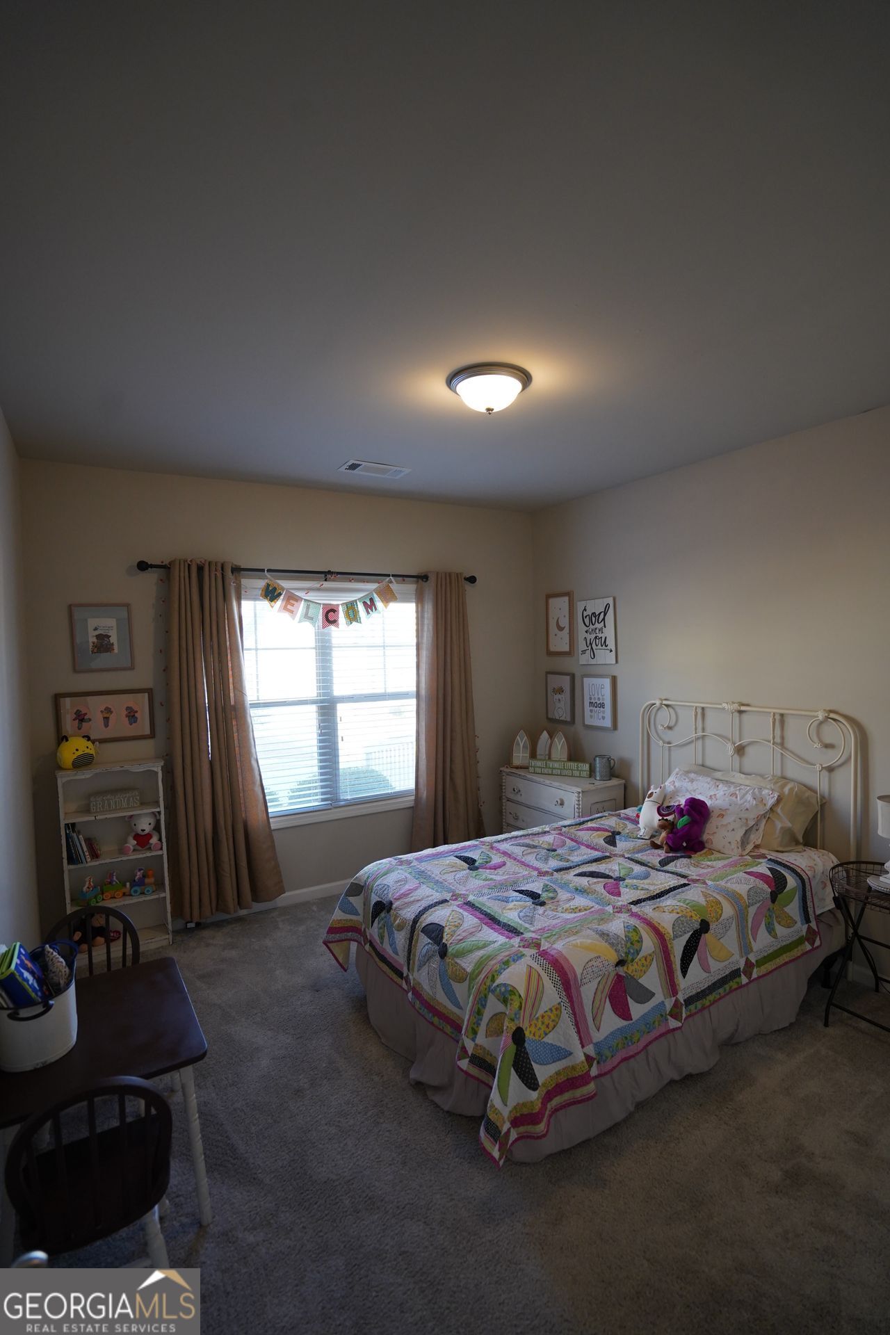 7671 Silk Tree Braselton, GA 30517 - Photo 45 of 92 a bedroom with a bed and a couch