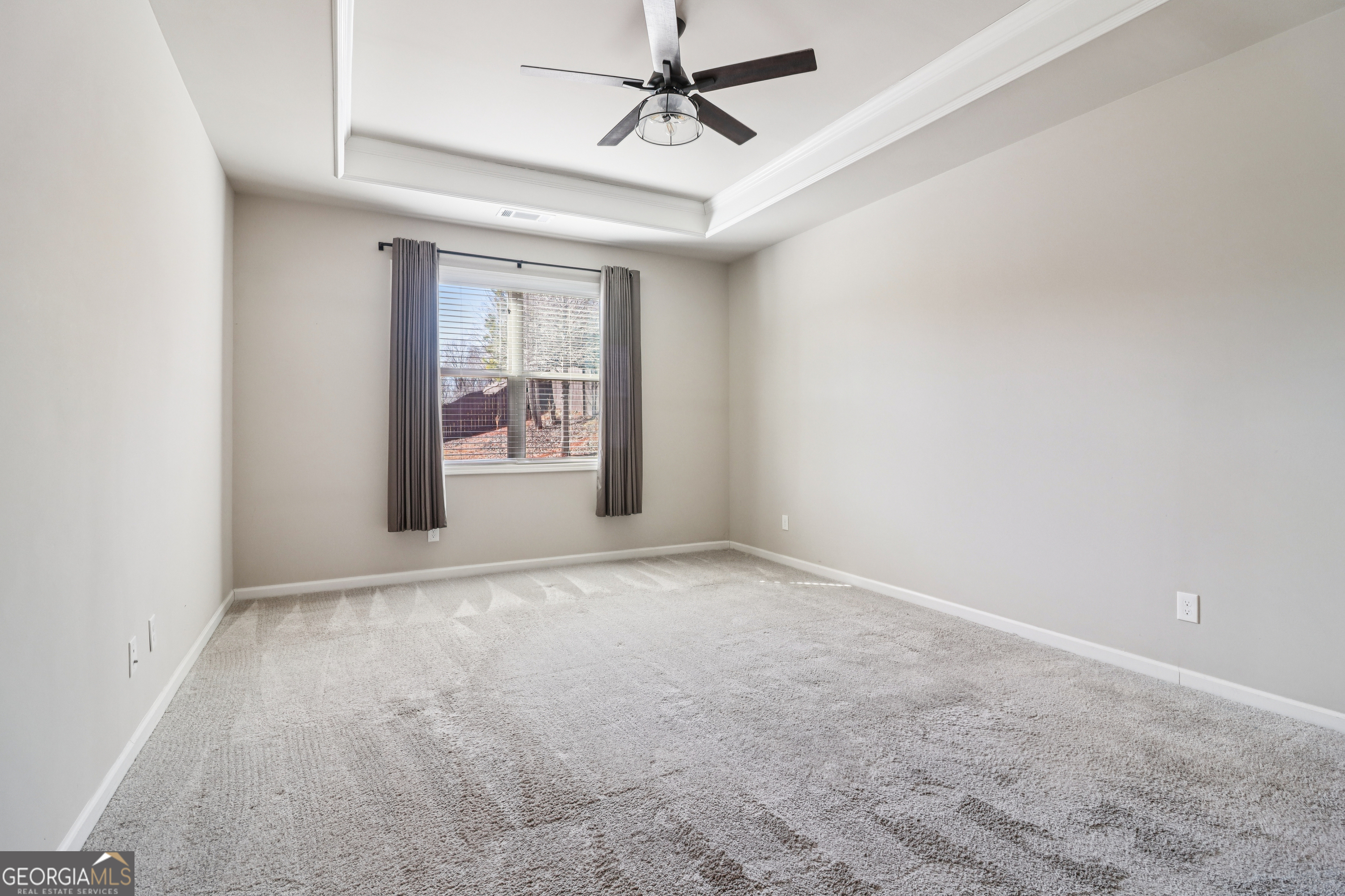 7671 Silk Tree Braselton, GA 30517 - Photo 48 of 92 a view of an empty room with a window