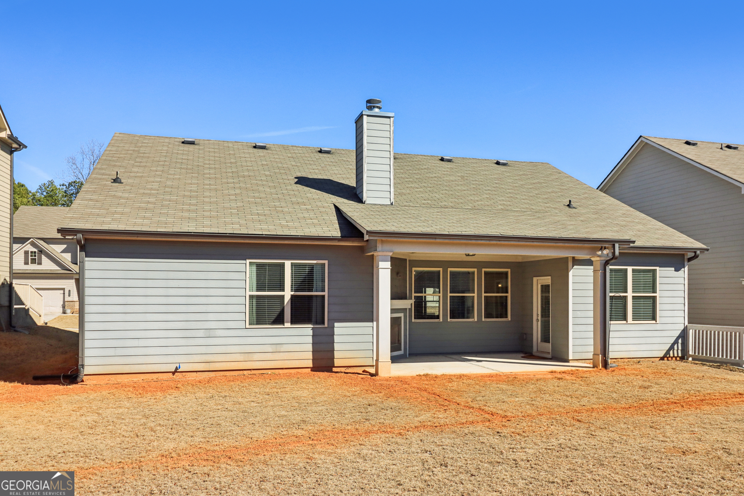 7671 Silk Tree Braselton, GA 30517 - Photo 70 of 92 a house with tree in front of it
