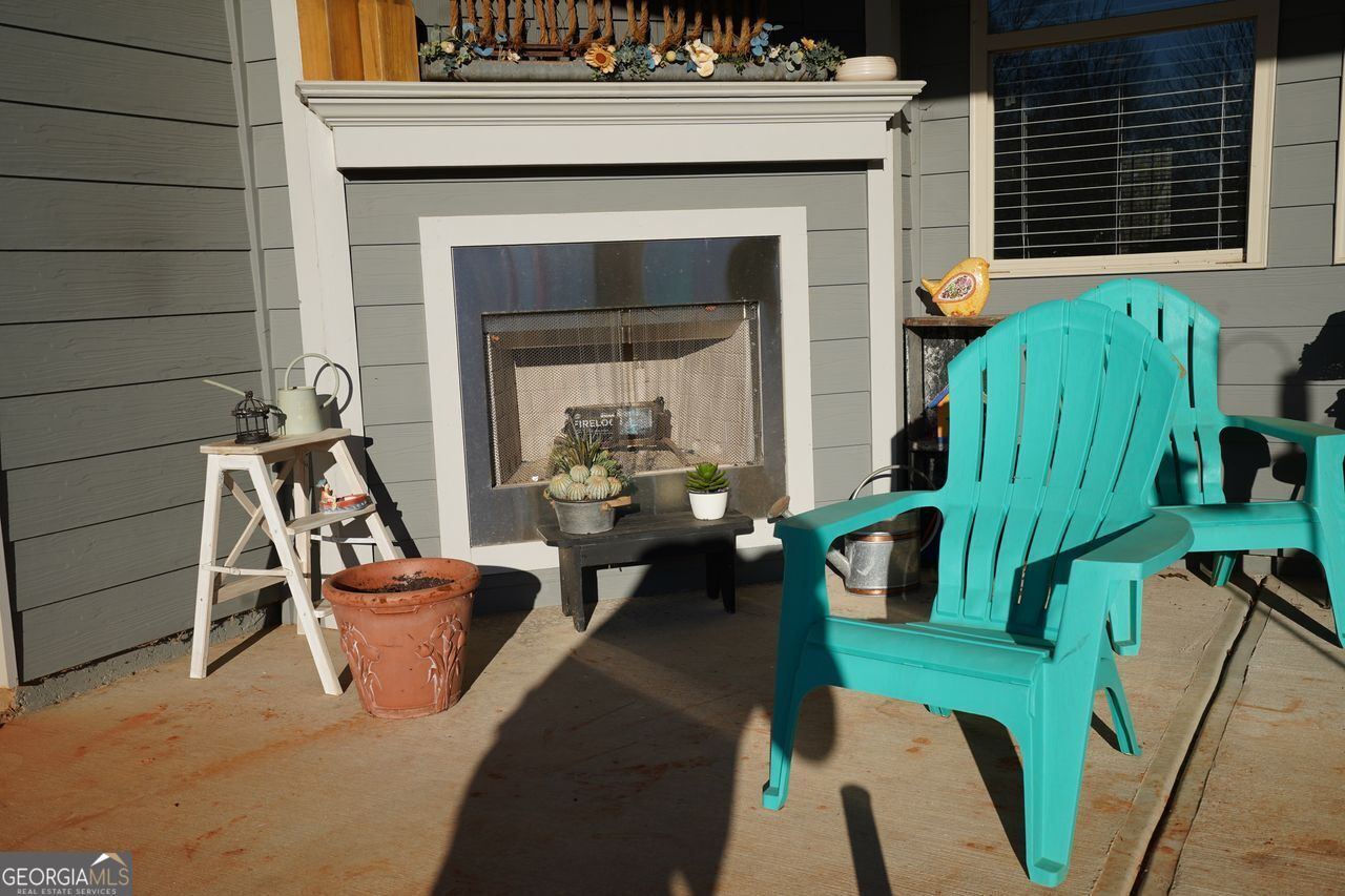 7671 Silk Tree Braselton, GA 30517 - Photo 77 of 92 a view of an outdoor sitting space