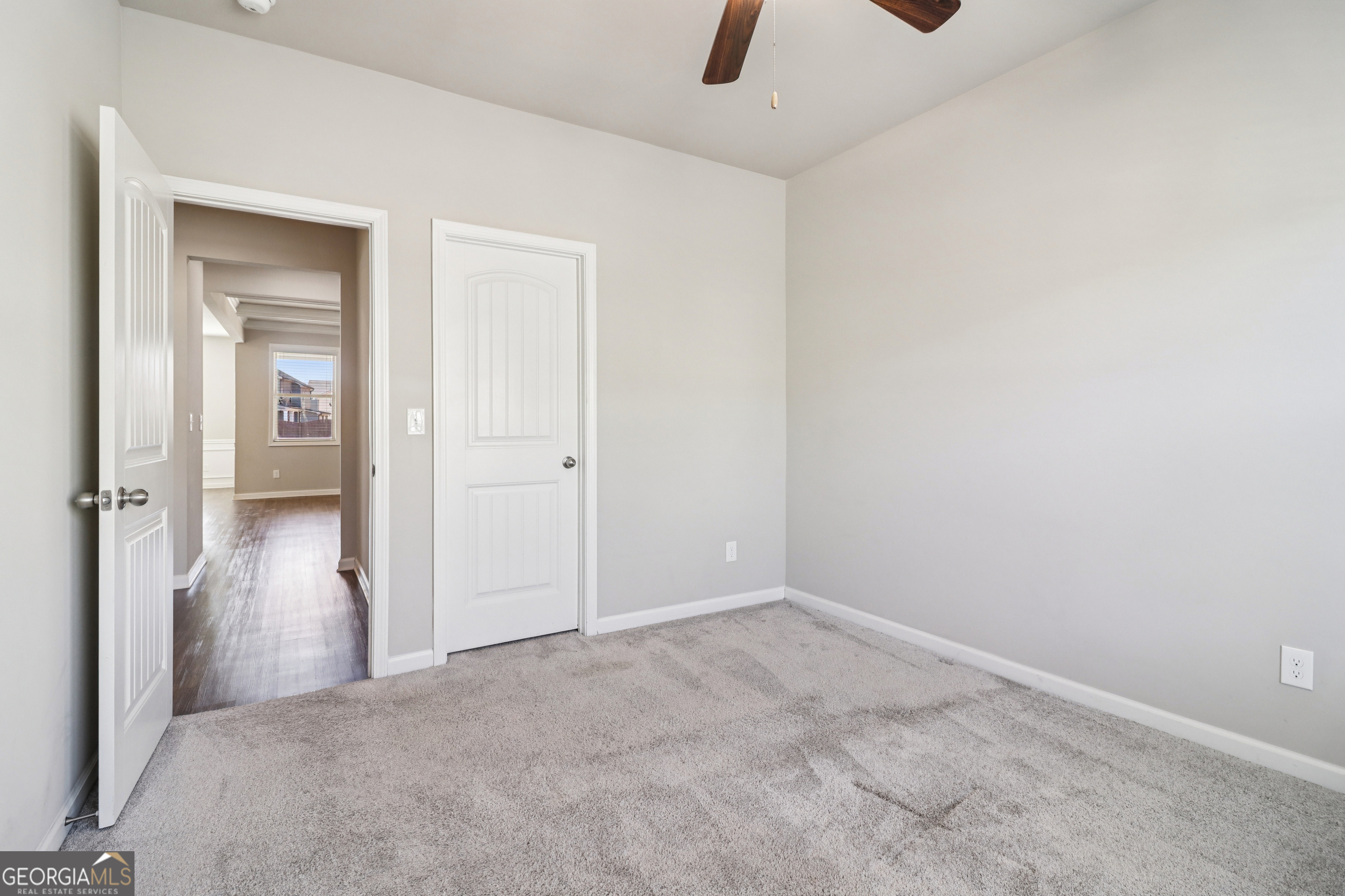 7671 Silk Tree Braselton, GA 30517 - Photo 85 of 92 wooden floor in an empty room