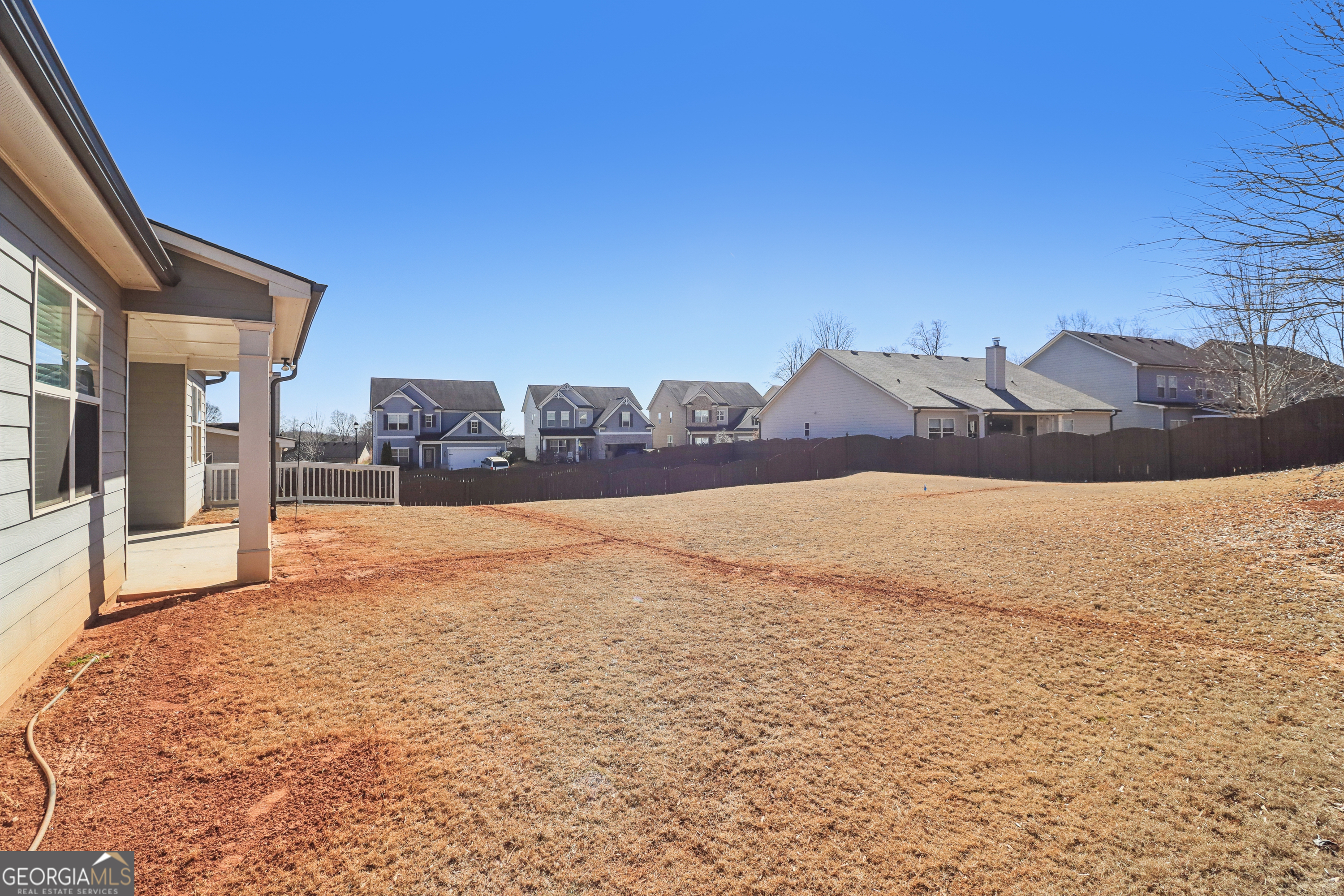 7671 Silk Tree Braselton, GA 30517 - Photo 92 of 92 a view of large house with a yard