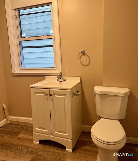 166 Laurel Avenue Bridgeport, CT 06605 - Photo 11 of 15 a bathroom with a toilet and a sink