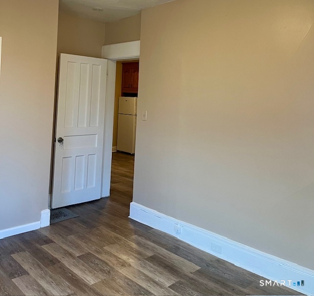 166 Laurel Avenue Bridgeport, CT 06605 - Photo 12 of 15 a view of front door with wooden floor