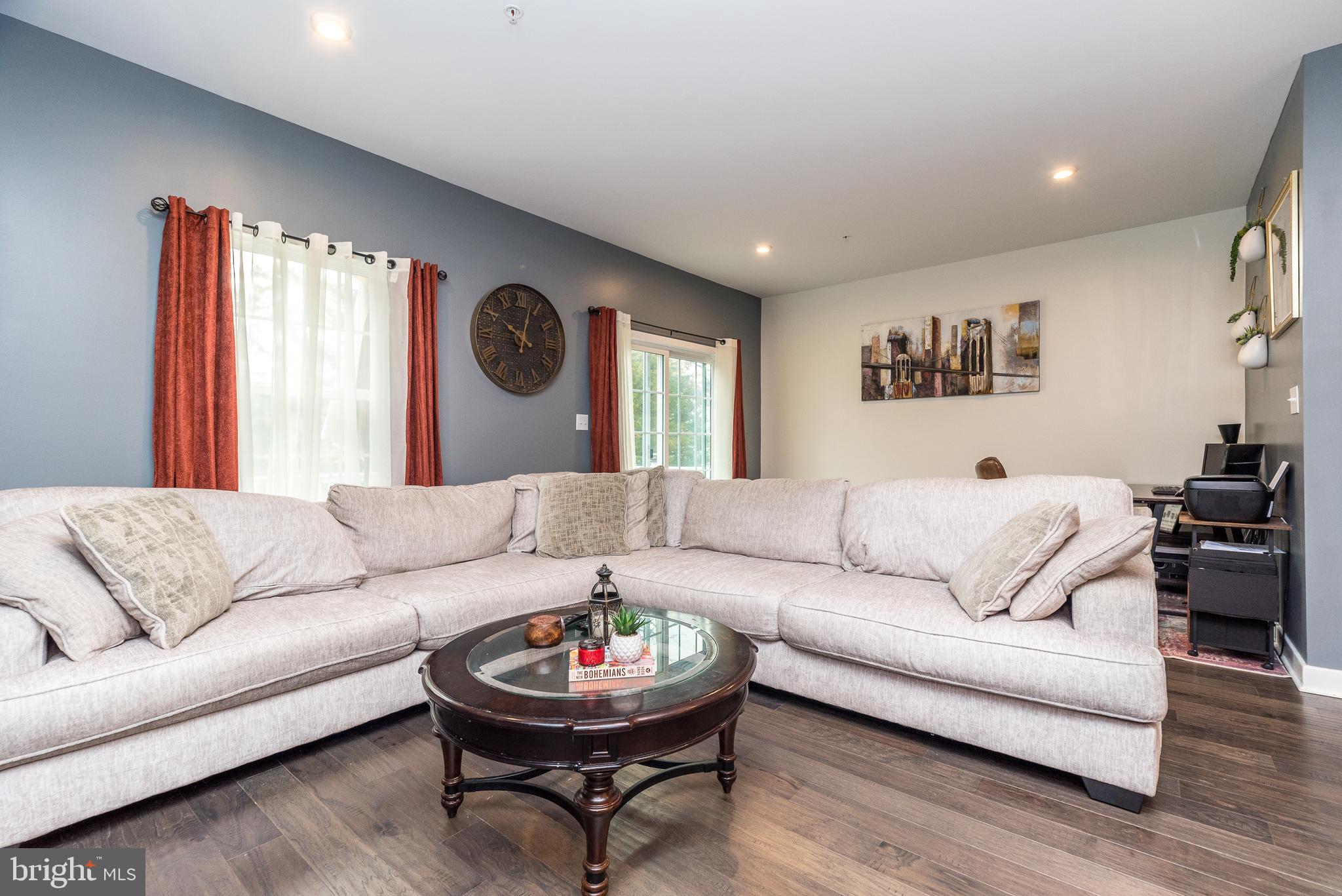 121 Arbor Boulevard Perkasie, PA 18944 - Photo 12 of 39 a living room with furniture and a large window