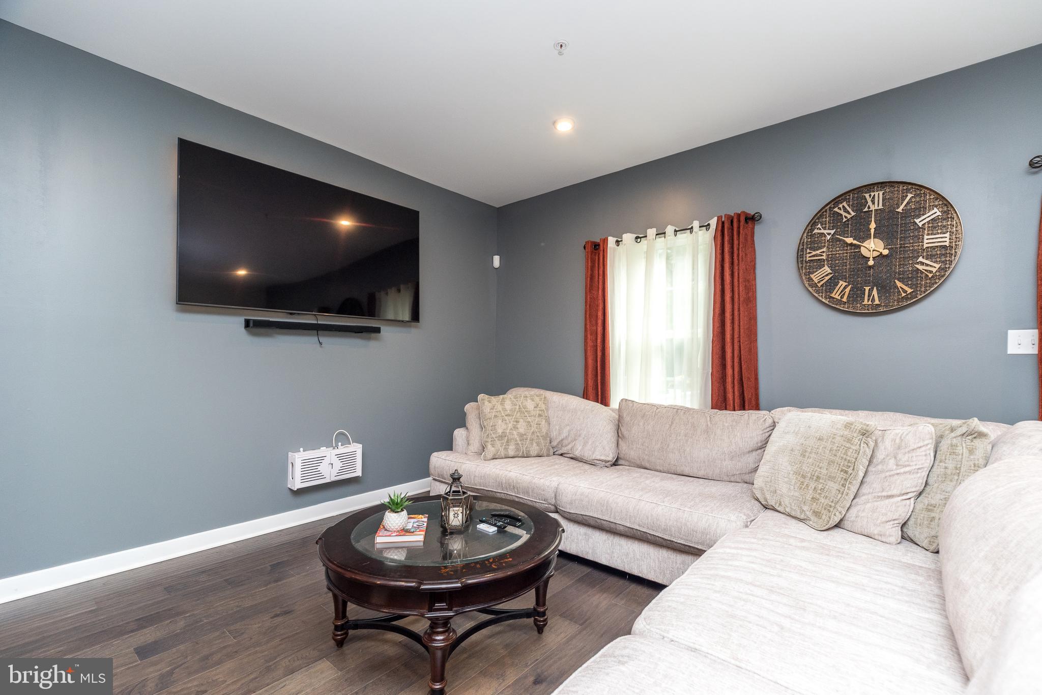 121 Arbor Boulevard Perkasie, PA 18944 - Photo 13 of 39 a living room with furniture and a flat screen tv