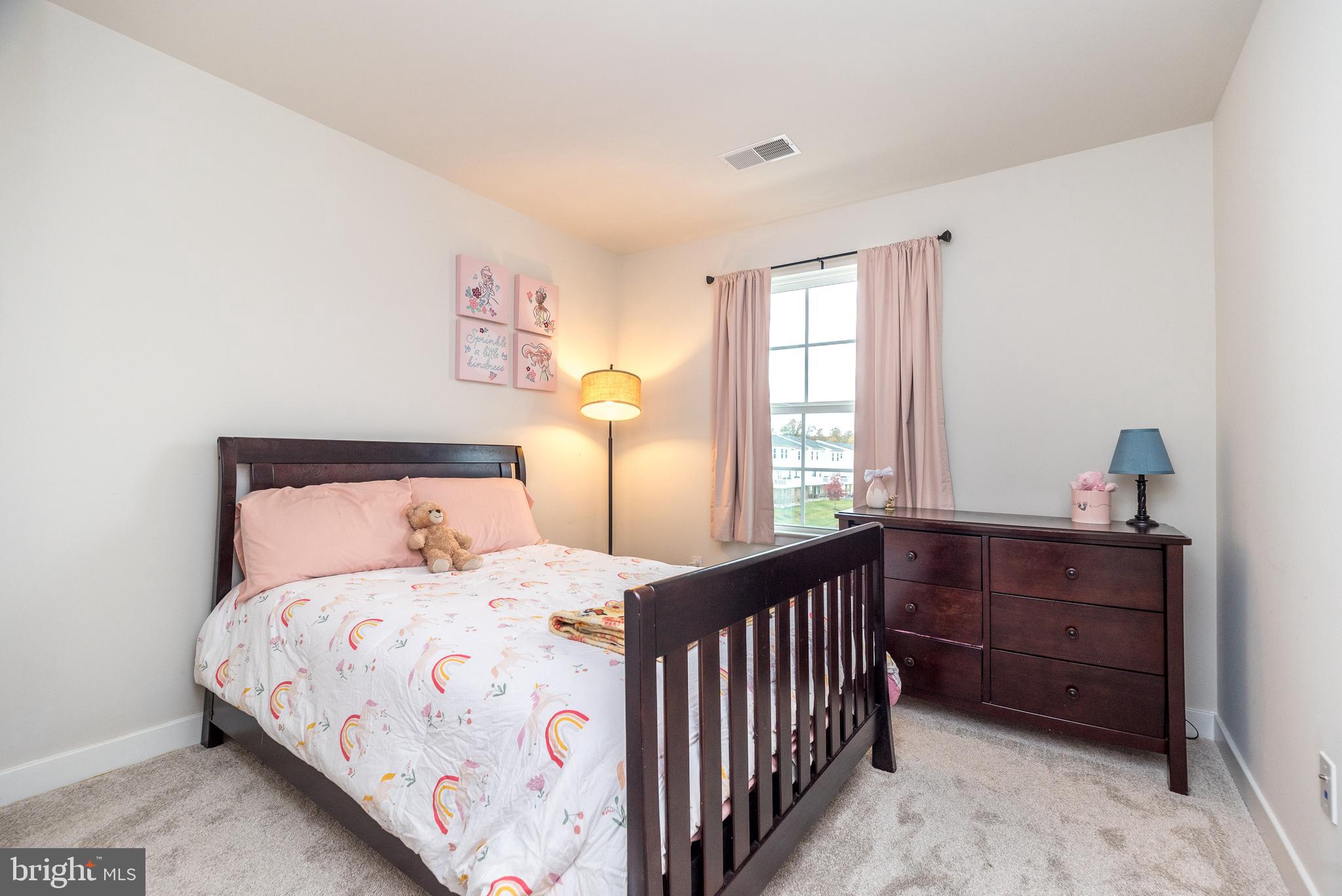 121 Arbor Boulevard Perkasie, PA 18944 - Photo 28 of 39 a bedroom with a bed and a window