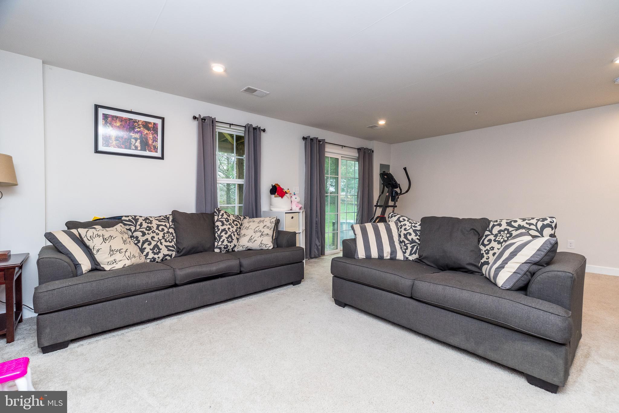 121 Arbor Boulevard Perkasie, PA 18944 - Photo 32 of 39 a living room with furniture and a couch
