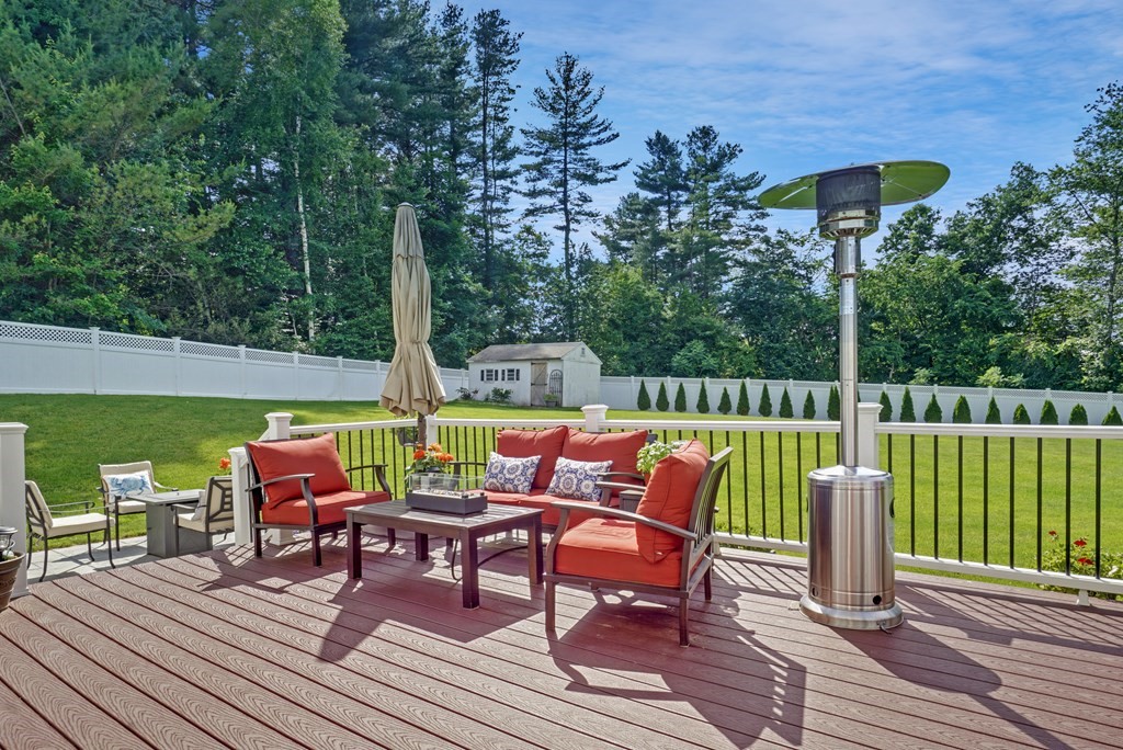 3 Stable Road Nashua, NH 03062 - Photo 29 of 32 an outdoor sitting area with furniture and wooden floor