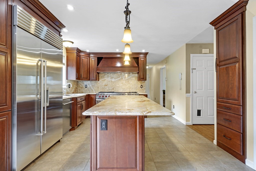 3 Stable Road Nashua, NH 03062 - Photo 5 of 32 a kitchen with stainless steel appliances granite countertop a refrigerator and a sink