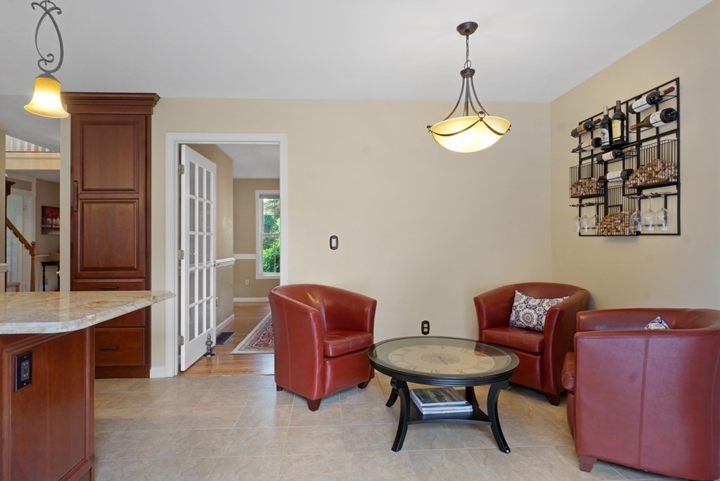 3 Stable Road Nashua, NH 03062 - Photo 6 of 32 a room with furniture and a chandelier
