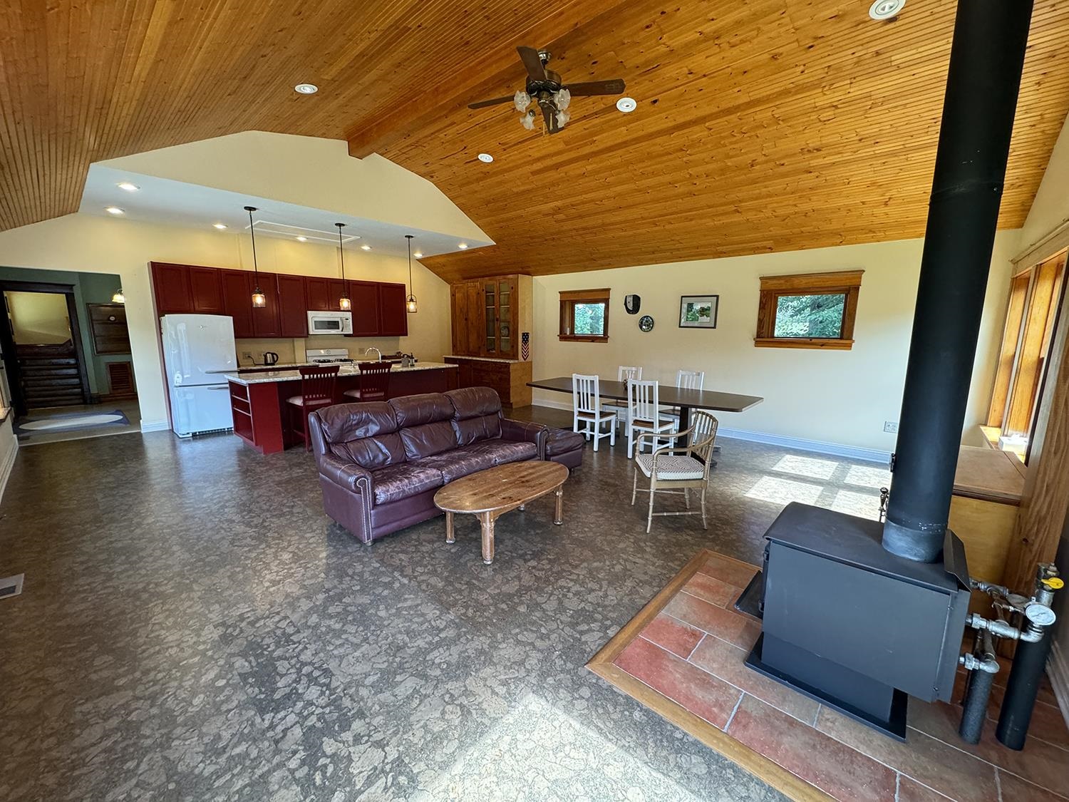 7261 Mill Road Mount Carroll, IL 61053 - Photo 23 of 50 a living room with furniture a rug and a flat screen tv
