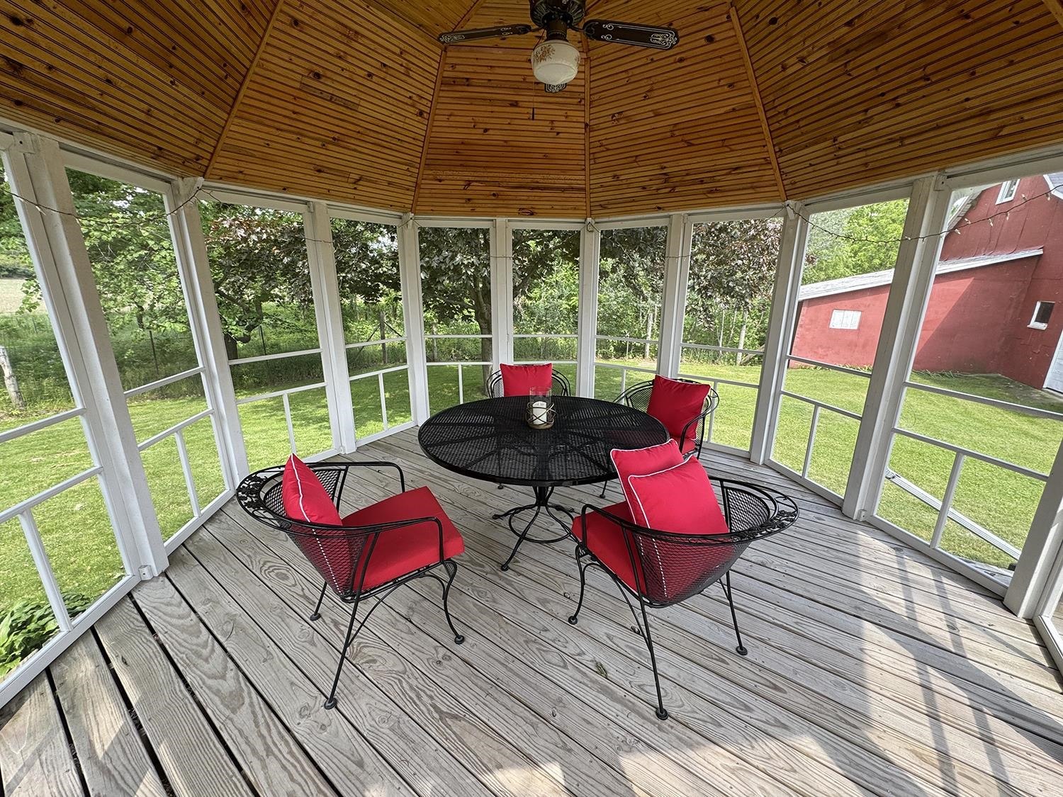 7261 Mill Road Mount Carroll, IL 61053 - Photo 7 of 50 a view of porch with seating area