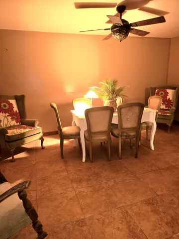 a view of a workspace with furniture