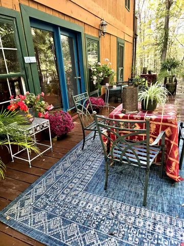 a outdoor space with lots of tables and chairs