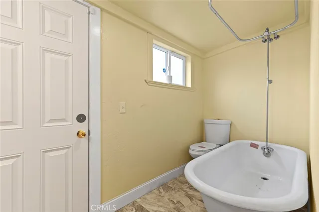 a bathroom with a sink and a toilet