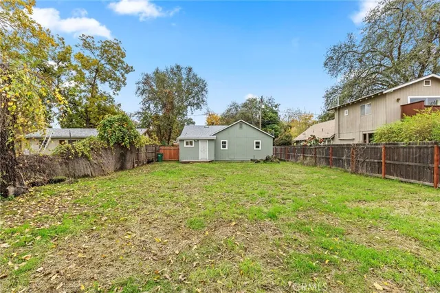 a house view with a garden space