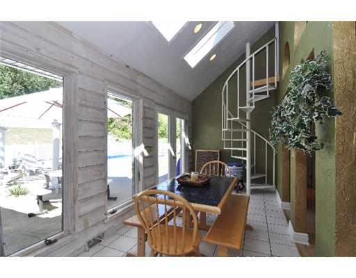 177 Shenot Road Wexford, PA 15090 - Photo 14 of 18 Sunroom. Private Back Yard with apple trees, leading to wooded area.