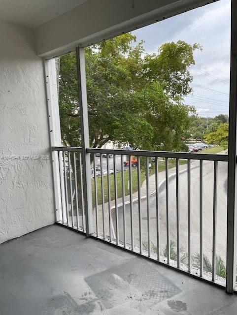 5612 Rock Island Road, Unit 167 Tamarac, FL 33319 - Photo 8 of 16 a view of a porch