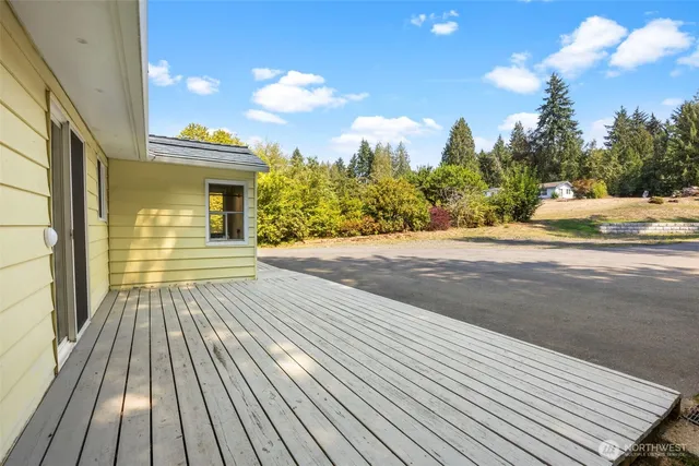 a view of a backyard of the house