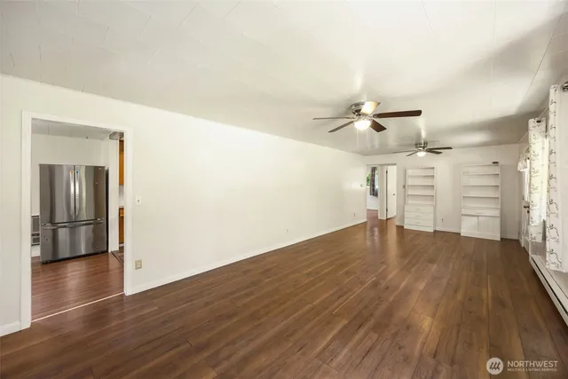 a view of a livingroom with wooden floor