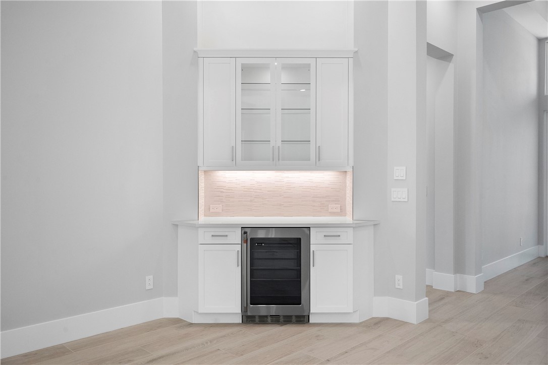 129 Strand Drive Vero Beach, FL 32963 - Photo 11 of 30 a view of an empty room with wooden floor and closet
