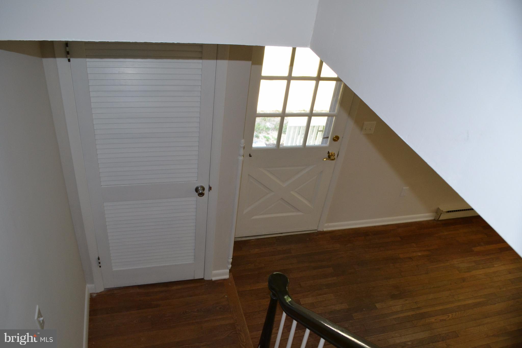 7598 Blueberry Acres Road St. Michaels, MD 21663 - Photo 22 of 30 Stairway and cloak closet