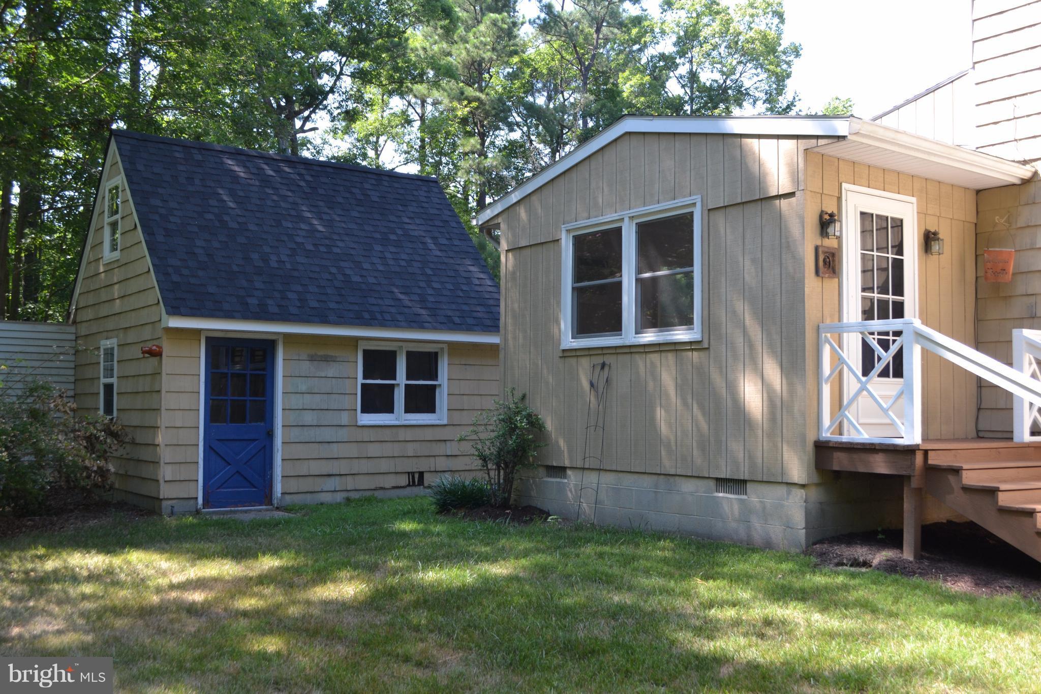 7598 Blueberry Acres Road St. Michaels, MD 21663 - Photo 24 of 30 Shed and side door to house