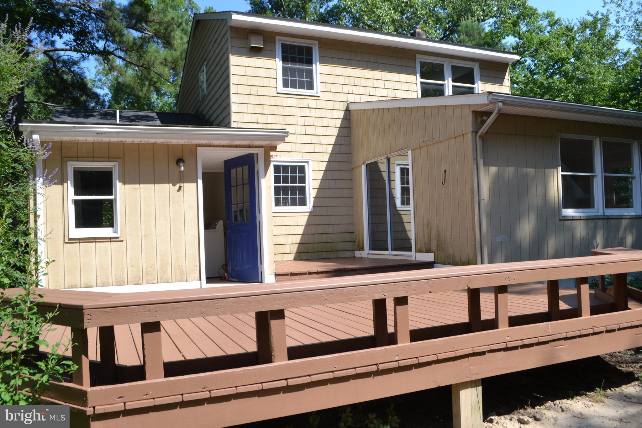 7598 Blueberry Acres Road St. Michaels, MD 21663 - Photo 5 of 30 Large deck with seating