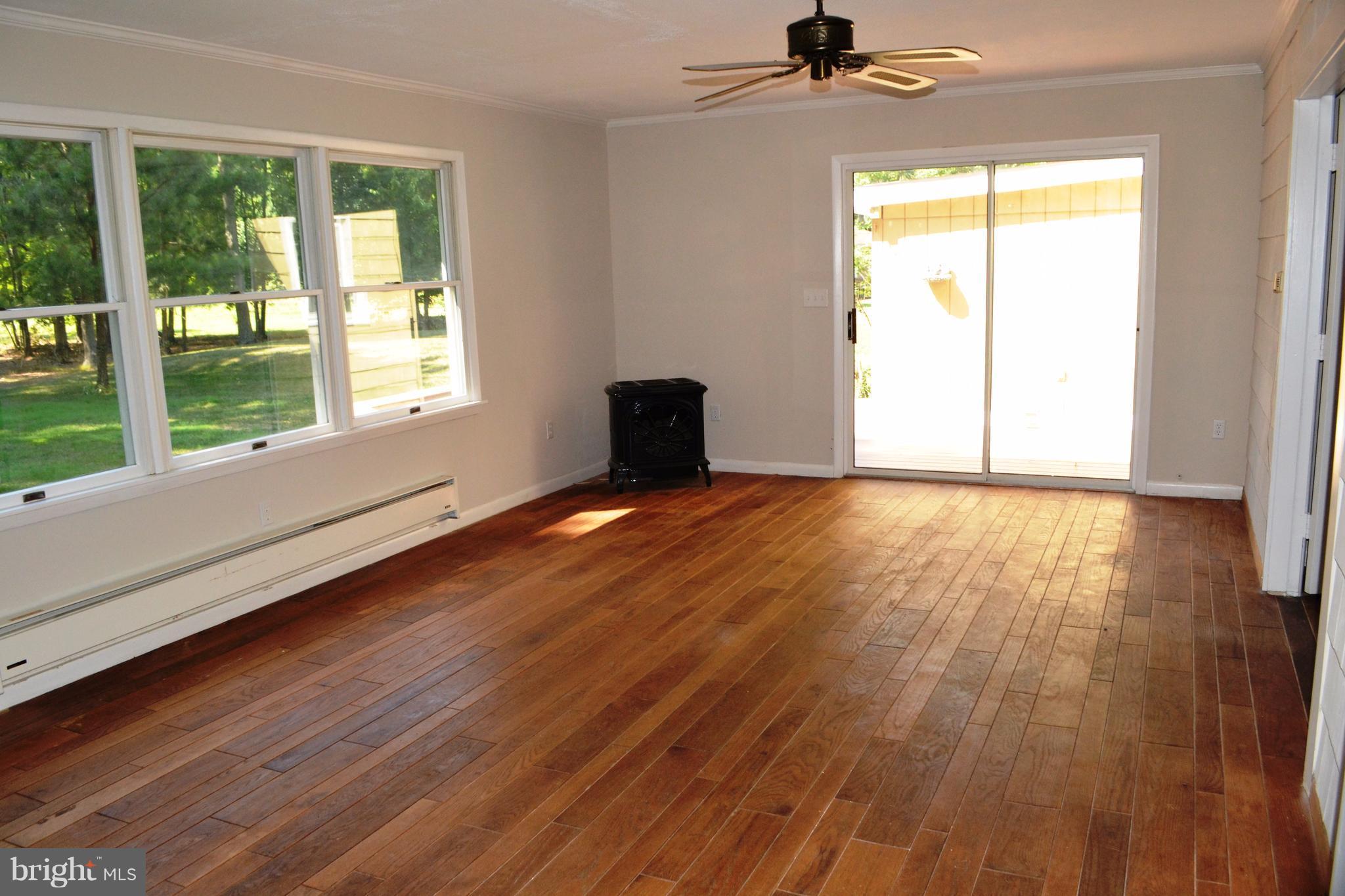 7598 Blueberry Acres Road St. Michaels, MD 21663 - Photo 6 of 30 Sun Room with access to deck