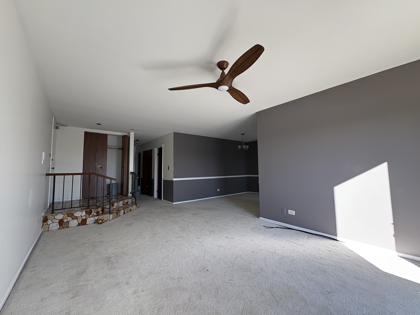 372 Springlake Lane, Unit C Aurora, IL 60504 - Photo 2 of 10 an empty room with closet and wooden floor