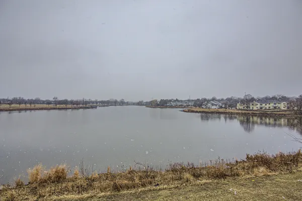 a view of a lake with a beach
