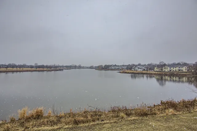 a view of a lake with a beach