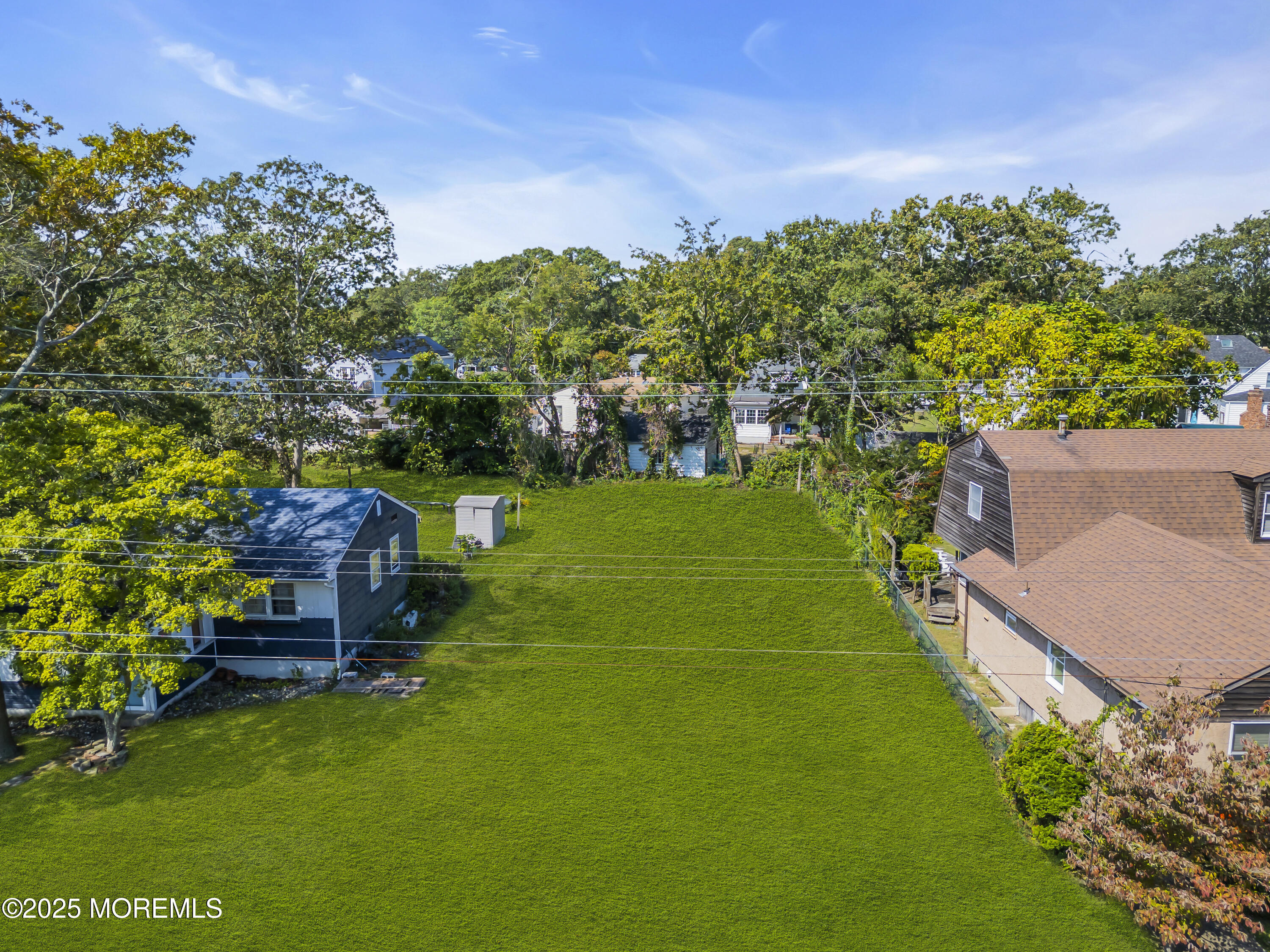 505 Curtis Avenue Point Pleasant, NJ 08742 - Photo 1 of 11 a green field with lots of trees in it
